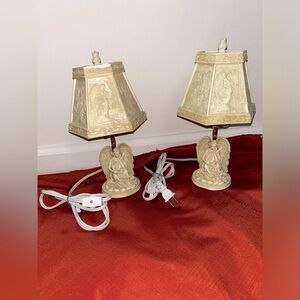 2 identical vintage angelic lamps. They are 9 inches tall and 4.5 inches wide !